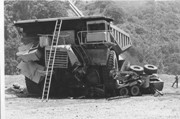 Incredible Carnage Photo: A Mining Dump Truck Squashed an 18-Wheeler and a Road Grader